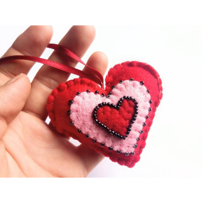 Heart with beads on a ribbon