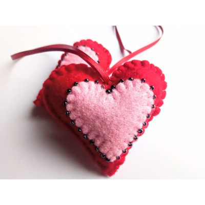 Heart with beads on a ribbon